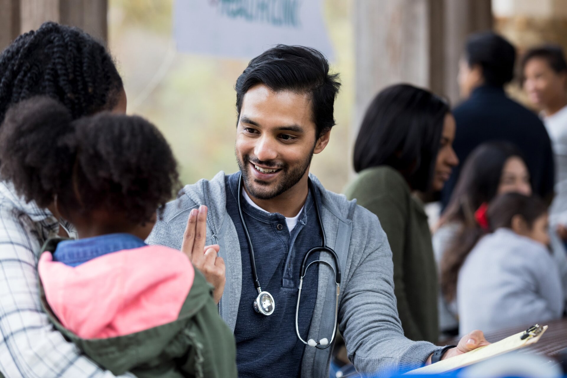 CommuniCare+OLE outreach clinician with a patient